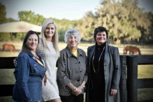 Carol Harris with attendees at Bo-Bett Farm