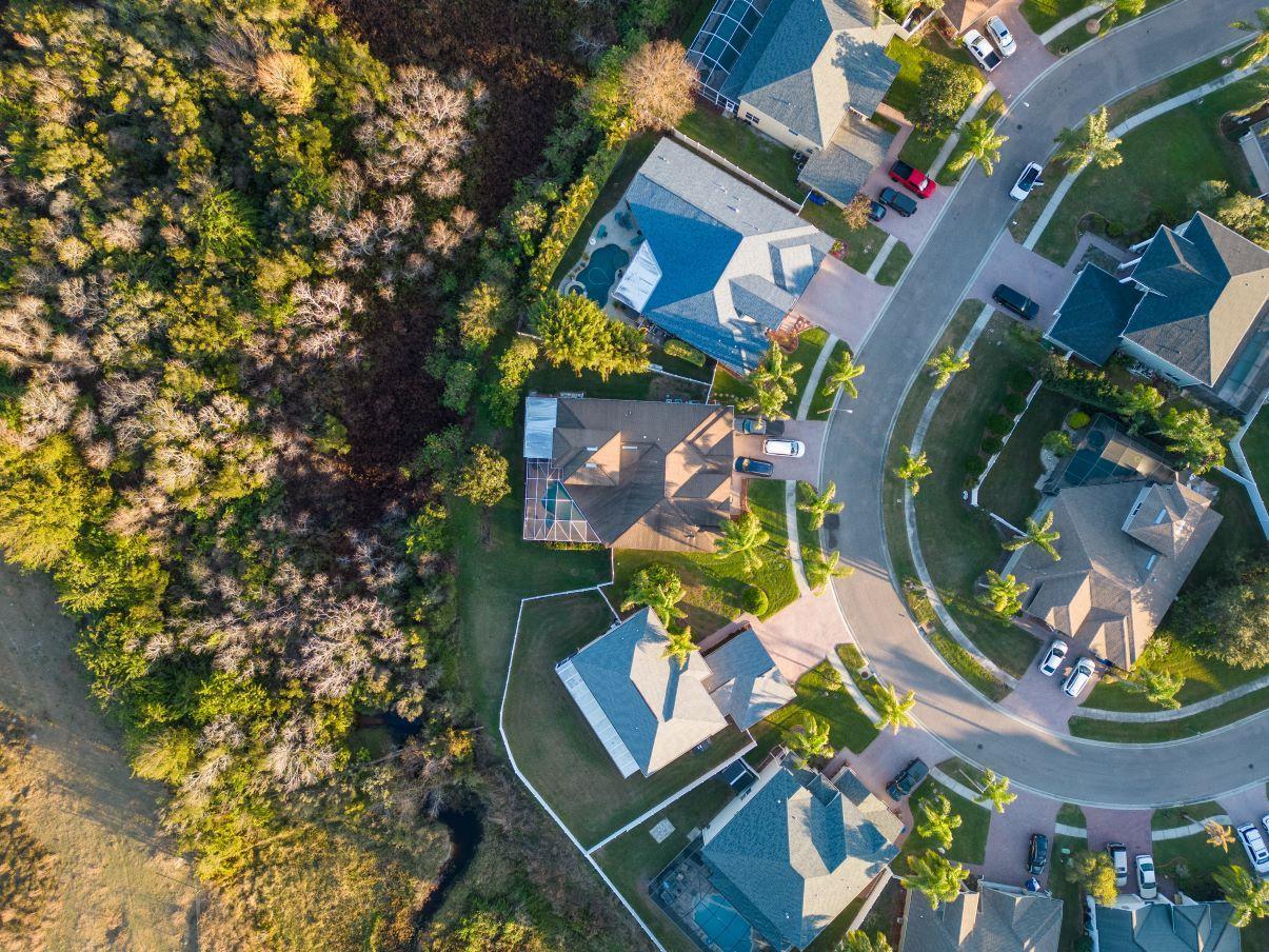 Top down view of Florida Home with Pool enclosure in neighborhood<br />
