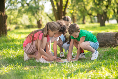 Children exploring in a park.