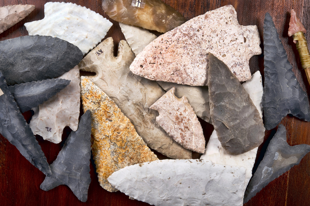 An assortment of stone arrowheads.