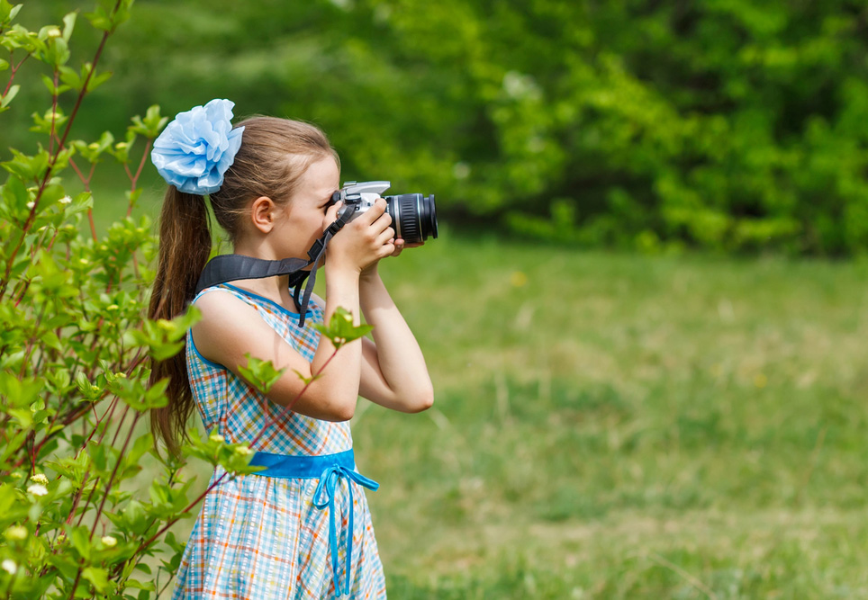 A girl taking photographs